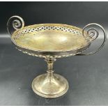 A silver bonbon dish on a single foot by Martin, Hall & Co, hallmarked for Sheffield 1908.