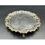 A Carrington & Co silver tray on three horseshoe feet, hallmarked for London 1936 (Approximate