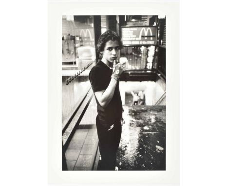 From the 42nd Street Boys series, 1980. 30 x 20 cm. Gelatin silver print, titled, dated and signed in pencil on bottom verso.