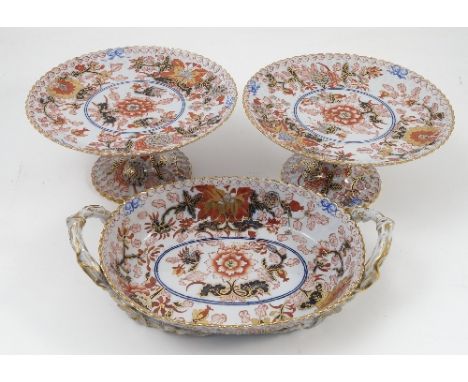 A 19th century Spode porcelain oval bowl, with scalloped edge, twig moulded handles and feet, decorated in red, blue and gold