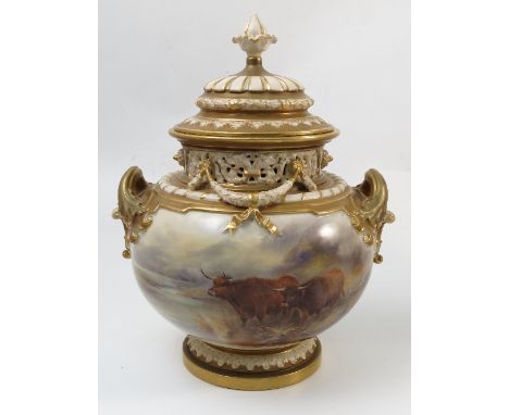 A Royal Worcester bow piece vase and cover, decorated with Highland cattle by J Stinton, to a gilt and ivory ground, shape nu