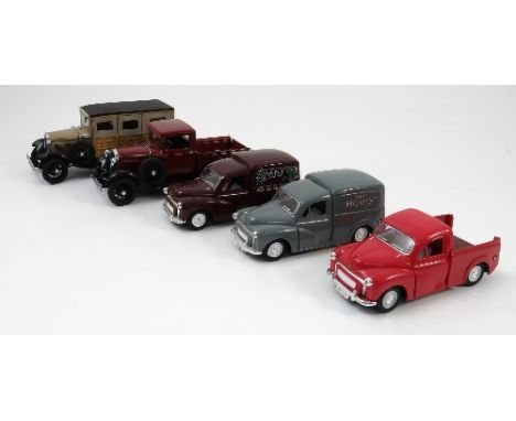 A Danbury Mint model, of a 1931 Ford Model A Pickup, together with a Danbury Mint 1931 Ford Model A Station Wagon, a Saico Mo