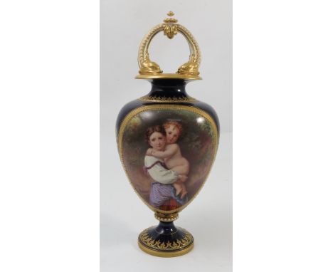 A 19th century Worcester vase, mounted with gilt dolphins to a deep blue ground, with reserve panel of mother and child, shap