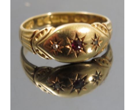 A diamond and ruby 18ct gold ring, Chester 1905, finger size P, weight 2.g gross 