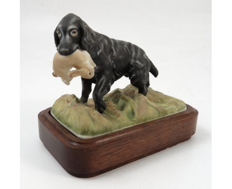 A Royal Worcester model, of a Cocker Spaniel, one of a series of Sporting Dogs, modelled by Doris Lindner, on plinth base, he