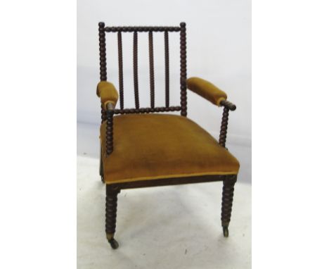 A 19th century open armchair, with a bobbin turned frame
