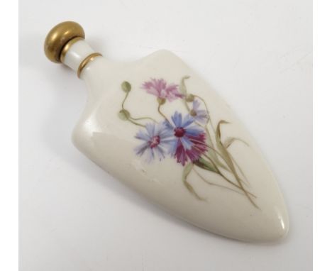 A Royal Worcester perfume bottle, with gilt stopper, the triangular body decorated with flowers to both sides, puce mark, hei