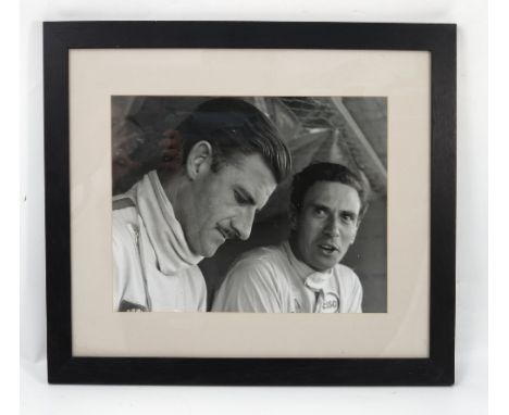 A black and white print, of Jimmy Clark and Graham Hill, 11ins x 15ins