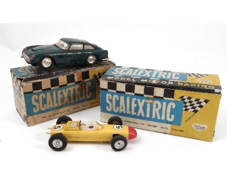 Two boxed Tri-ang Scalextric cars, an Aston Martin DB4 GT and a Ferrari GT 250 Berlinetta without lights, together with an un