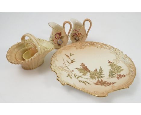 A group of Royal Worcester blush ivory, to include a shaped plate with pierced edge and decorated with a fern, a set of three