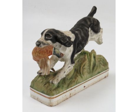 A Royal Worcester model, of a Springer Spaniel, one of a series of Sporting Dogs, modelled by Doris Lindner, height 5.5ins