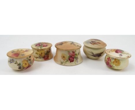Four Royal Worcester blush ivory circular covered boxes, decorated with flowers, together with another decorated with birds i