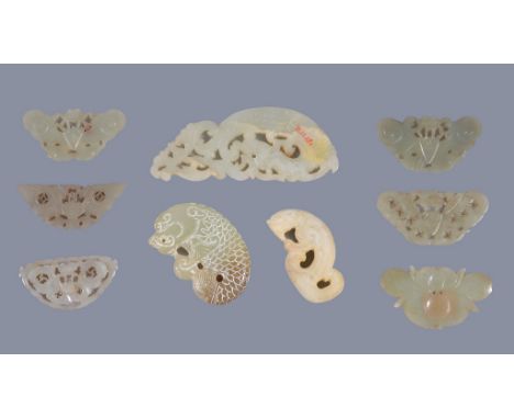  A group of six Chinese carved jade butterflies  ; two other jade carvings of mythical beasts; and a Chinese jade dragon plaq
