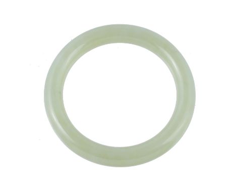  A Chinese celadon jadeite bangle,   with white inclusions, external diameter 8cm and internal wrist measurement 5.8cm 