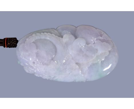  A Chinese carved small white 'dragon' boulder,   20th century, with apple green, mutton-fat white and lavender inclusions, c