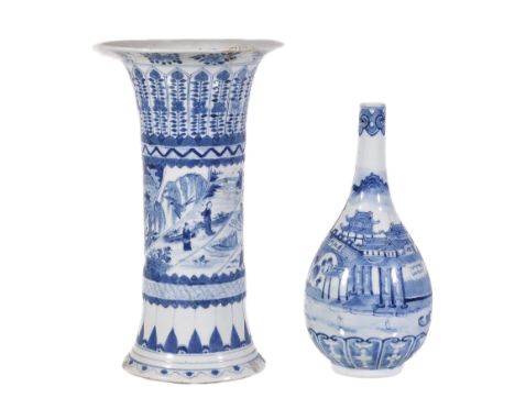  A Chinese blue and white bottle vase,   Qing Dynasty, late 19th century, painted with a pavilion, the base with underglaze b