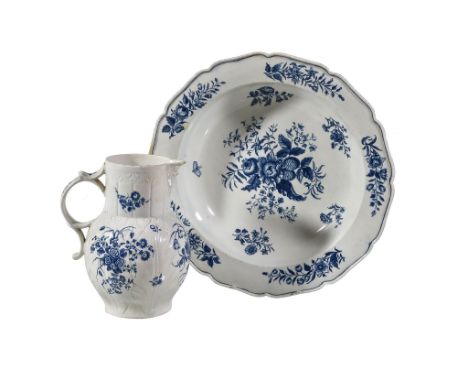  A Worcester blue and white porcelain cabbage-leaf-moulded mask jug,   circa 1780, printed with the 'Bouquets' pattern, hatch