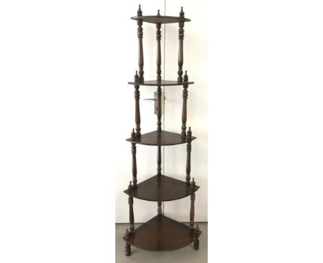 A vintage dark wood 5 shelf corner wotnot with turned columns and finial detail.  Approx. 152cm tall x 53cm wide.