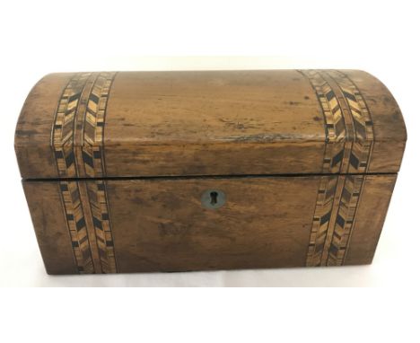A vintage dome topped wooden tea caddy with inlaid detail to lid and box front. Interior has 2 sections with lift off lids. A