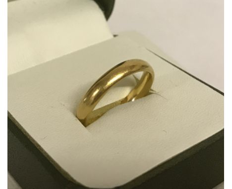 A vintage 22ct gold wedding band. Size Q. Total weight approx. 6.2g