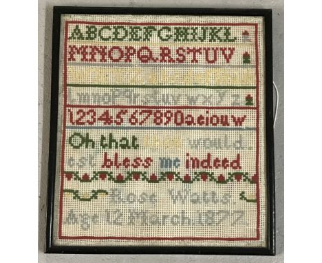 A framed &amp; glazed sampler by Rose Watts, age 12, 12 March 1877.  Frame size approx. 30cm x 27cm.