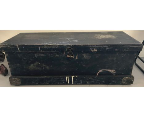 A vintage pine tool chest with metal banded bottom corners and interior tool shelf.  Approx. 31cm x 90cm x 37cm.