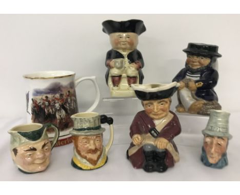 A collection of 6 vintage ceramic toby jugs together with a Danbury Mint "Waterloo" tankard. Toby jugs to include: Tony Wood,