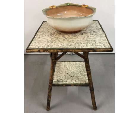 A square shaped early C20th bamboo table. With decoupage top and lower shelf.  Together with a decorative Art Nouveau style c