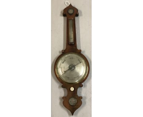 An antique mahogany framed wall hanging barometer. Glass to thermometer is damaged. Approx. 103cm tall.