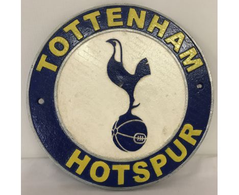 A modern, painted Tottenham Hotspur, circular shaped, wall hanging plaque.  Approx. 24cm diameter.