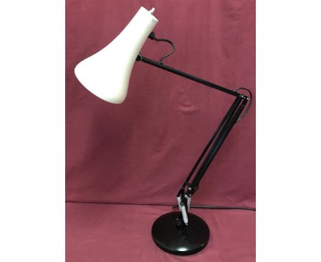 A large original 'Anglepoise' lamp with black frame and base and white metal shade.  