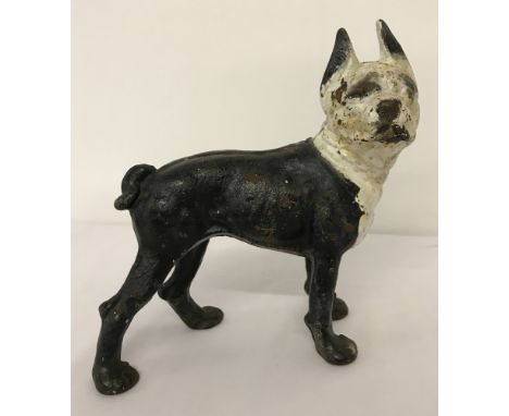 A vintage painted, heavy cast iron figurine of a French Bulldog.  Approx. 23cm tall.