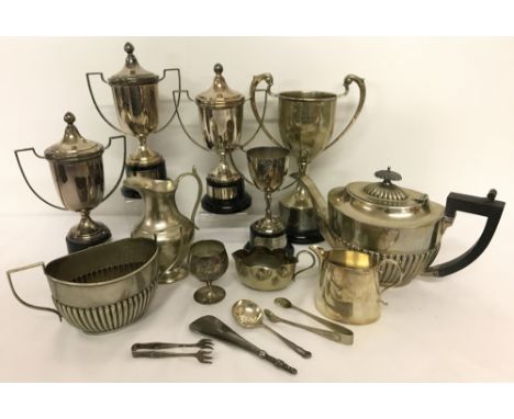 A box of assorted silver plated items to include teapot and matching sugar bowl. And a quantity of winners cups. 