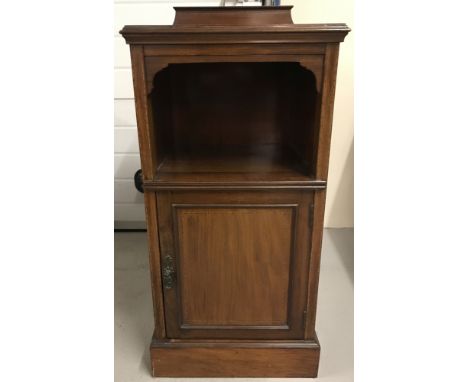 A Victorian mahogany bedside cabinet with inlaid detail to top and front. Open fronted compartment and cupboard with interior