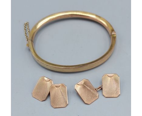 A 9ct gold bangle together with a pair of 9ct gold cufflinks, 11.8gms