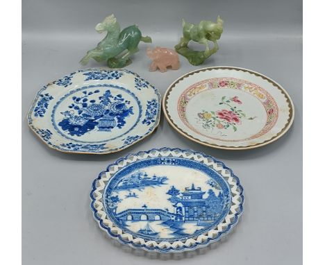 A Chinese underglaze blue decorated plate, two other dishes and three Chinese Jade models