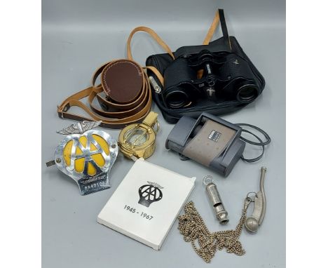 A pair of binoculars by Swarovski together with another pair of binoculars, a Bosuns whistle, a brass cased compass, two AA b