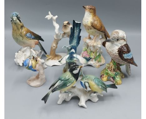 A Copeland Spode porcelain model of a Thrush together with a Beswick model of a Kookaburra and five similar models of birds 