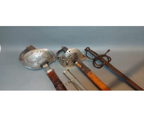 A George V officers sword together with another similar, a copy sword and a metal scabbard