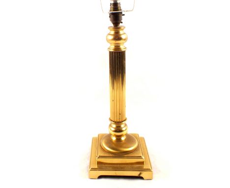 A brass Corinthian column table lamp