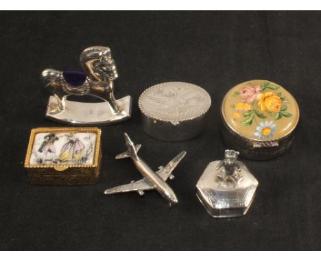 Two silver pill boxes, one with teddy bear finial, white metal rocking horse pin cushion plus other items