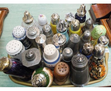 A quantity of sugar castors in ceramic, glass, pewter etc