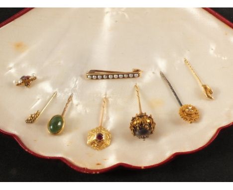 A selection of stick pins, most 15ct or 18ct gold, various styles including bird, ruby and sapphire set, diamond set and a se