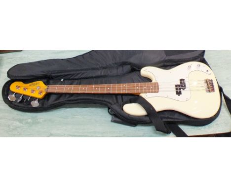 A Crafter electric bass guitar in case plus a Stagg CA 20B bass amplifier