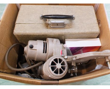 A Bell & Howell 606H 8mm film projector (this item is sold as a collectors item only and has not been subject to an electrica