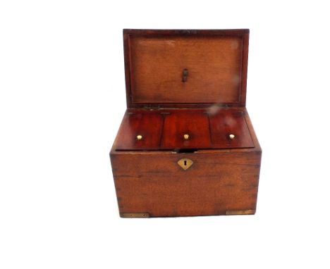 A large oak and brass bound three compartment tea caddy