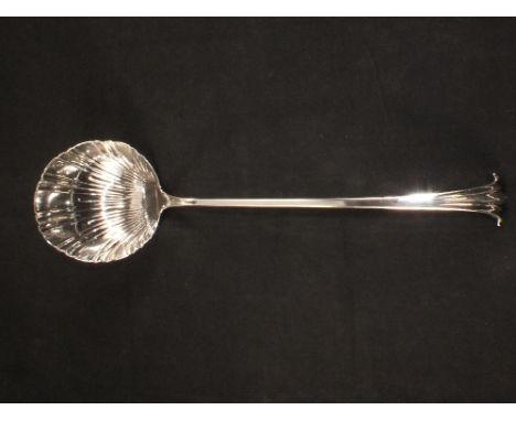 A Robert Sharp silver ladle with shell shaped bowl