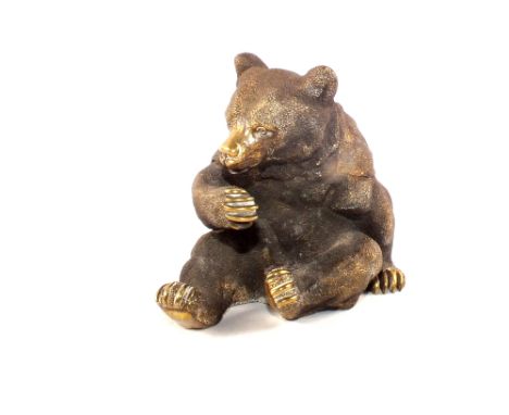A brass bear inkwell