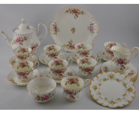 A Royal Albert 'Moss Rose' pattern tea service for six place settings, iincluding teapot milk jug and sandwich plate, (qty).