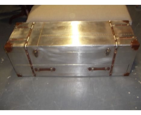 An Aviator style trunk, the hinged rectangular top above a drawer, W. 120cm.